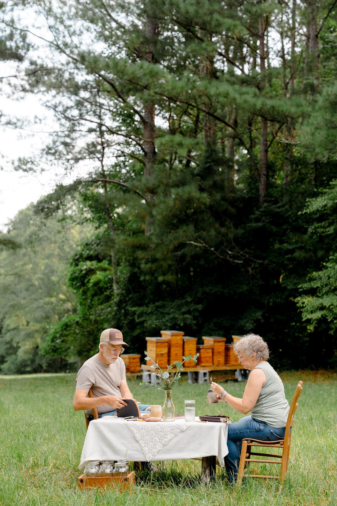 The Georgia Hive & Honey family among their hive rows
